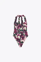 PRINTED HALTER BODYSUIT
