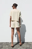 TEXTURED SHORTS WITH GOLD BUTTONS
