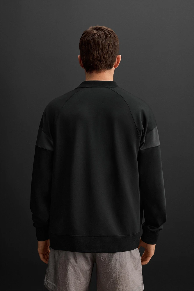 TECHNICAL SWEATSHIRT WITH ZIPPER