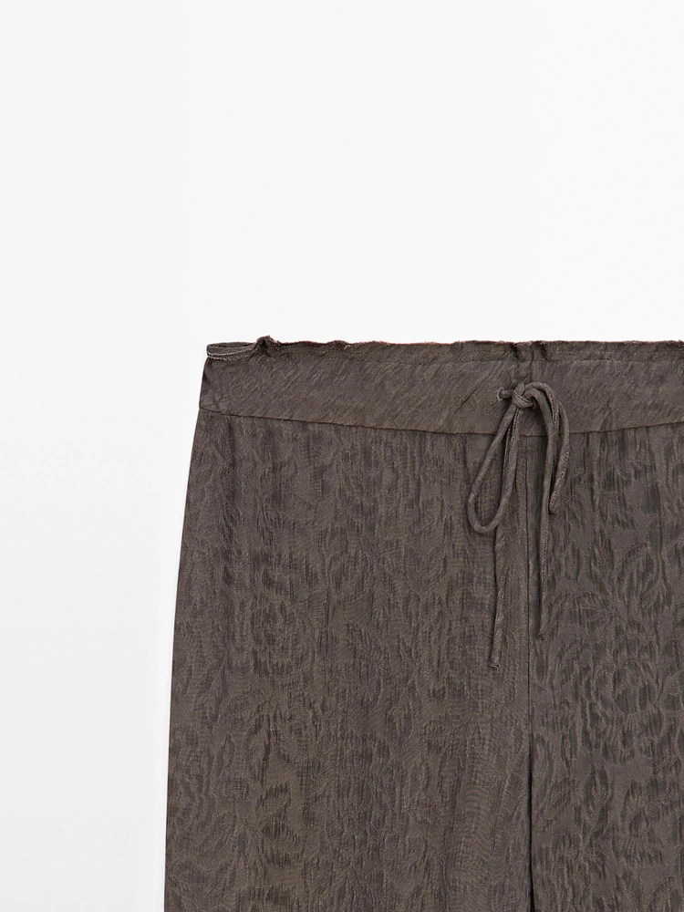 Flowing wide-leg jacquard trousers