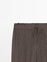 Flowing wide-leg jacquard trousers