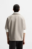TECHNICAL ZIP POLO SHIRT