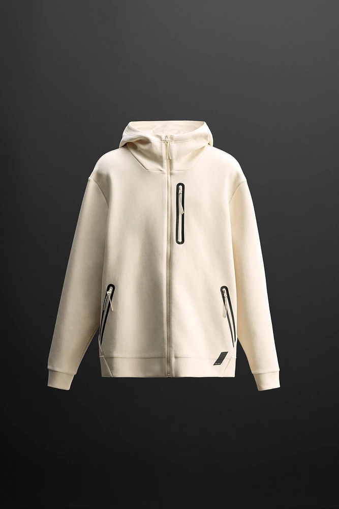 TECHNICAL ZIP SWEATSHIRT
