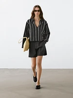 Blouse with embroidered details