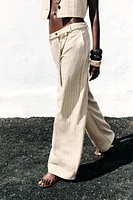 STRIPED PANTS WITH BRAIDED BELT