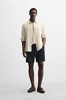 TEXTURED REGULAR FIT BERMUDA SHORTS