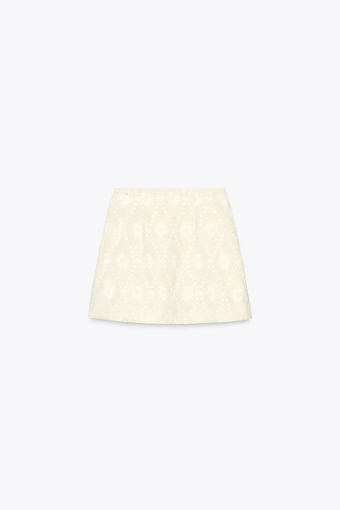 MINI SKIRT WITH FRAYED EMBROIDERY