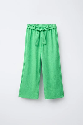 TEXTURED BELTED PANTS