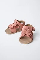 SANDALES EN CUIR PAPILLON