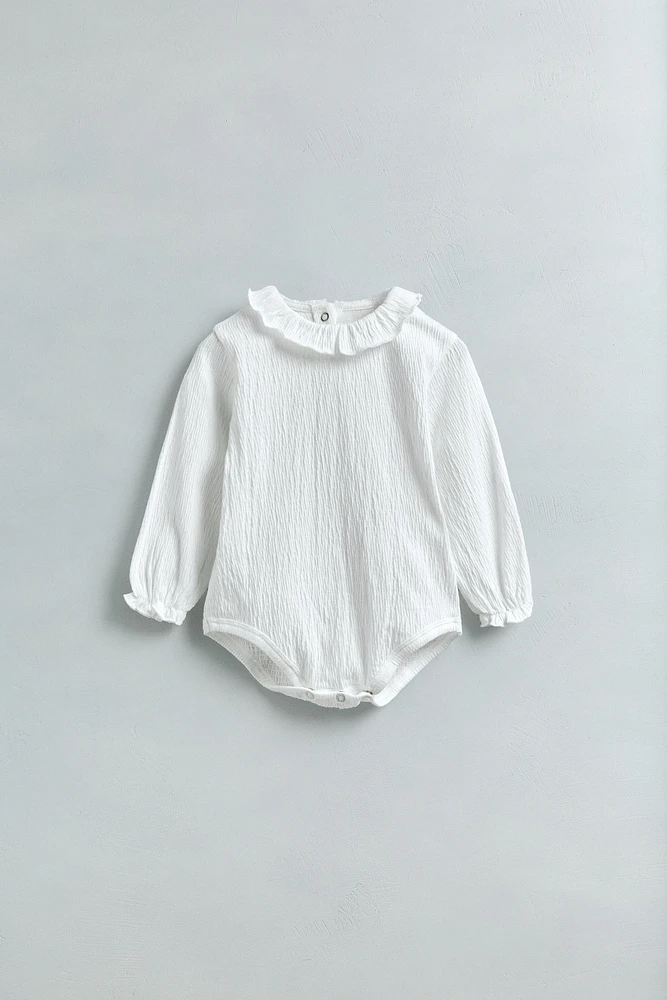TEXTURED BODYSUIT