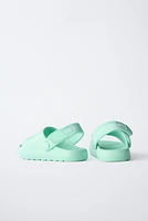 RUBBERIZED SLIDES