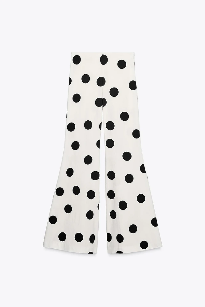 PANTALON FLARE À POIS TAILLE HAUTE