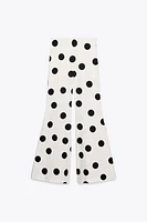 PANTALON FLARE À POIS TAILLE HAUTE