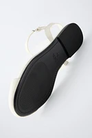 CHAUSSURES OUVERTES À L'ARRIÈRE EN VINYLE