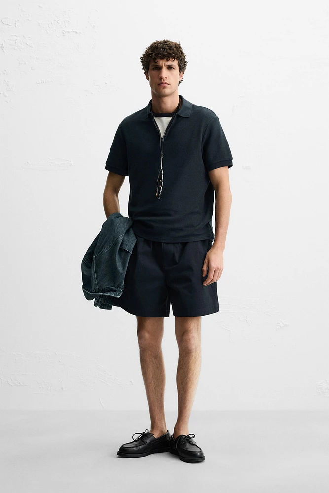 QUARTER ZIP POLO