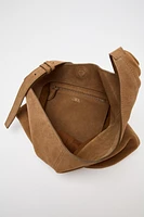 SAC SEAU SOFT ASYMÉTRIQUE EN CROÛTE DE CUIR