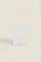 GLASS CUP WITH RAISED DESIGN