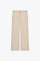 STRIPED PANTS WITH BRAIDED BELT