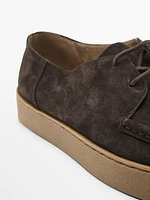 Chaussures en croûte de cuir avec ganse