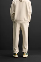 TECHNICAL ZIPPER JOGGER PANTS