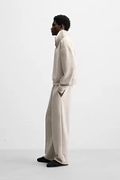 QUARTER ZIP TECHNICAL SWEATSHIRT