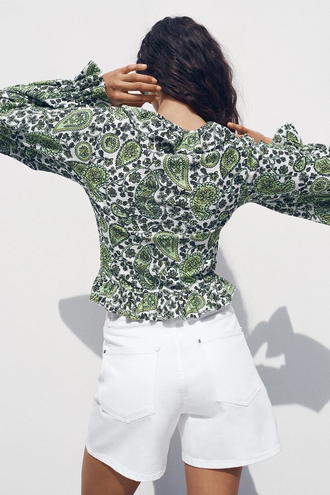 RUFFLED V-NECK TOP