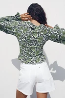 RUFFLED V-NECK TOP
