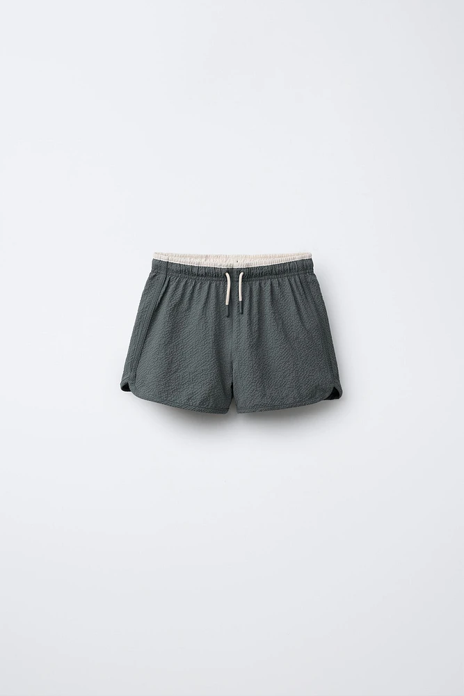 6-14 YEARS/TEXTURED SWIM SHORTS