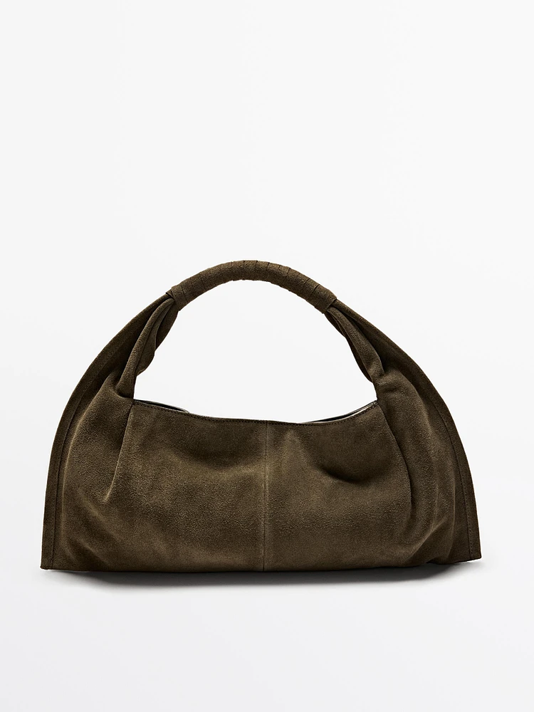 Split suede handbag