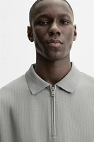 TEXTURED ZIP POLO SHIRT