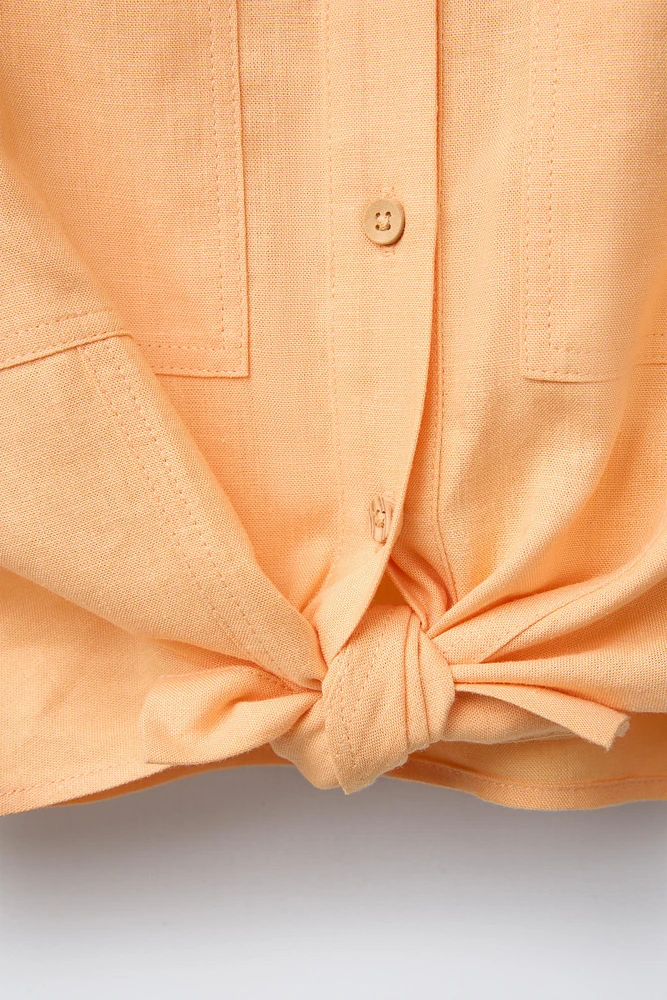 CHEMISE À NŒUD CONTENANT DU LIN