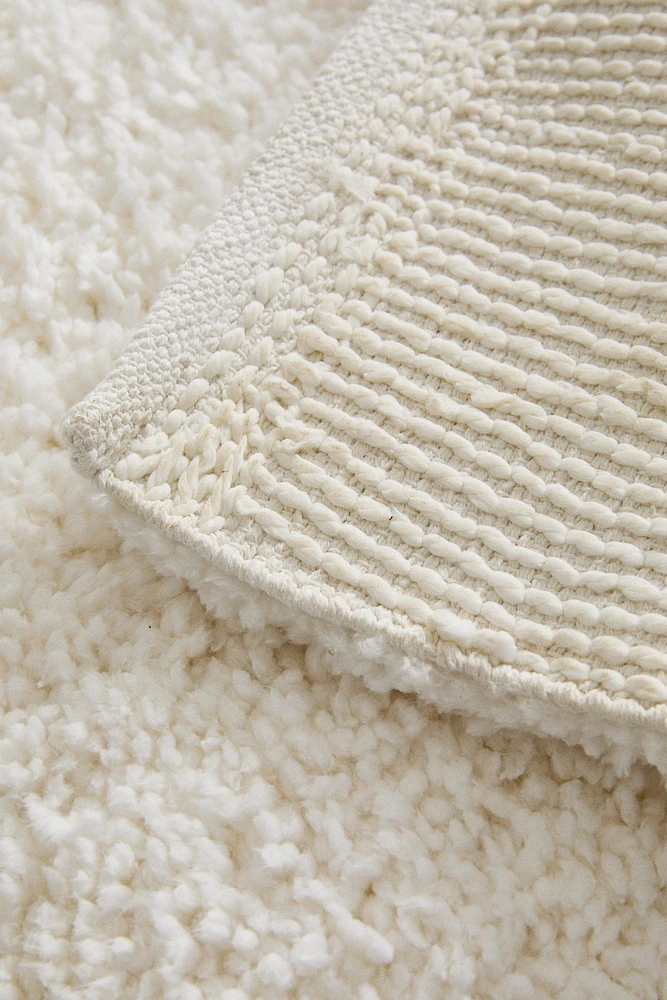 TAPIS TISSU BOUCLÉ