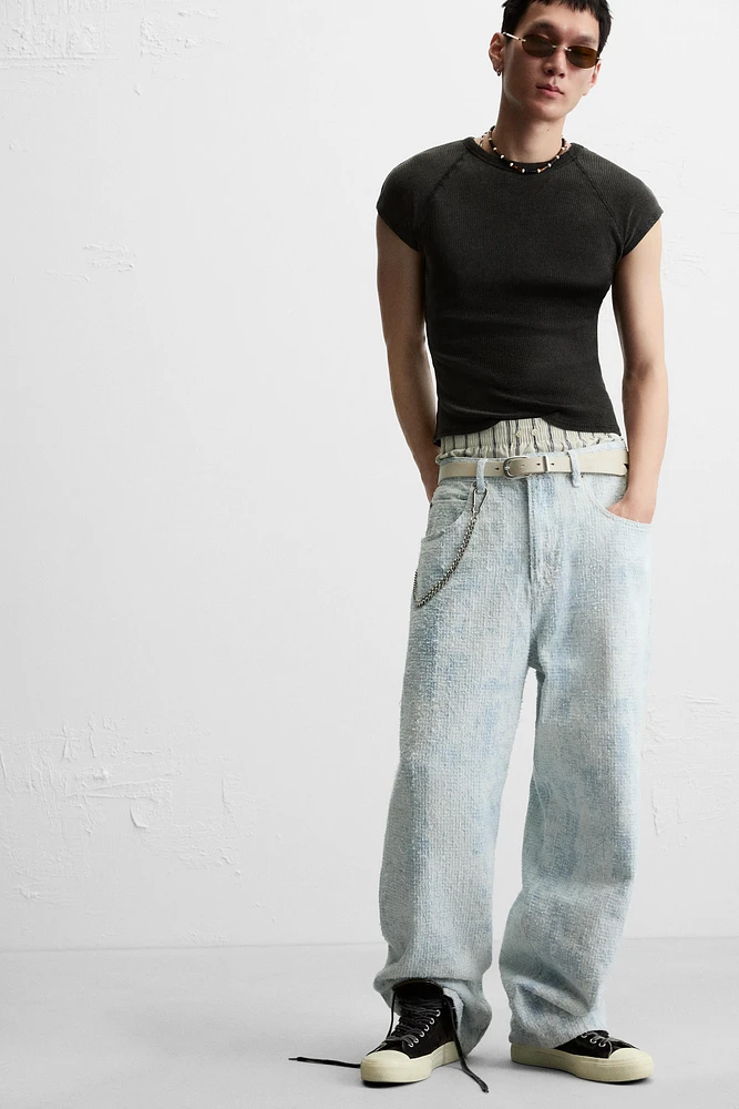 JEAN COUPE BAGGY FINI GRATTÉ