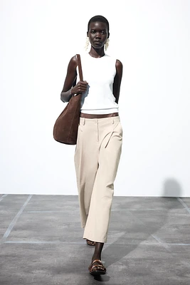 PLEATED CHINO PANTS