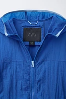 LIGHTWEIGHT PACKABLE WINDBREAKER