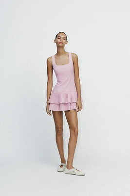 BOX PLEAT JUMPSUIT DRESS