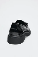 PATENT FINISH TASSELED LOAFERS