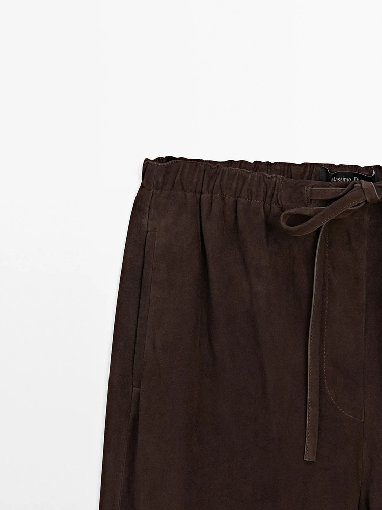 Suede leather parachute trousers