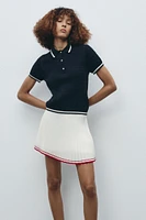 PLEATED MINI SKIRT