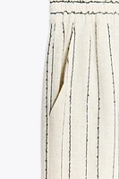 PANTALON RAYÉ À SEQUINS