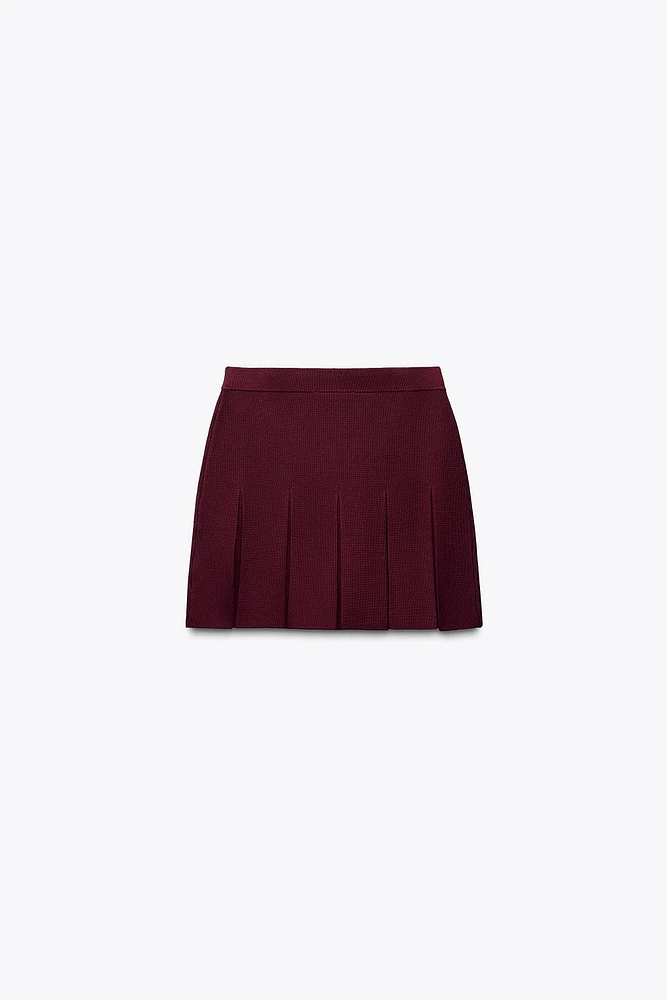 BOX PLEAT KNIT MINI SKIRT