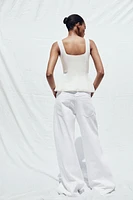 STRETCH PEPLUM VEST TOP