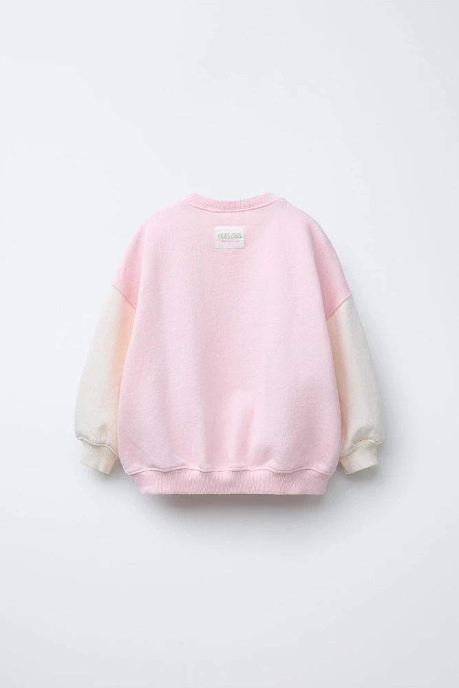 RAISED TEXT PRINT SWEATSHIRT