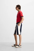 PLEATED STRIPED SHORTS