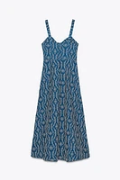 ROBE MIDI BRODERIES AJOURÉES EFFET GOMME