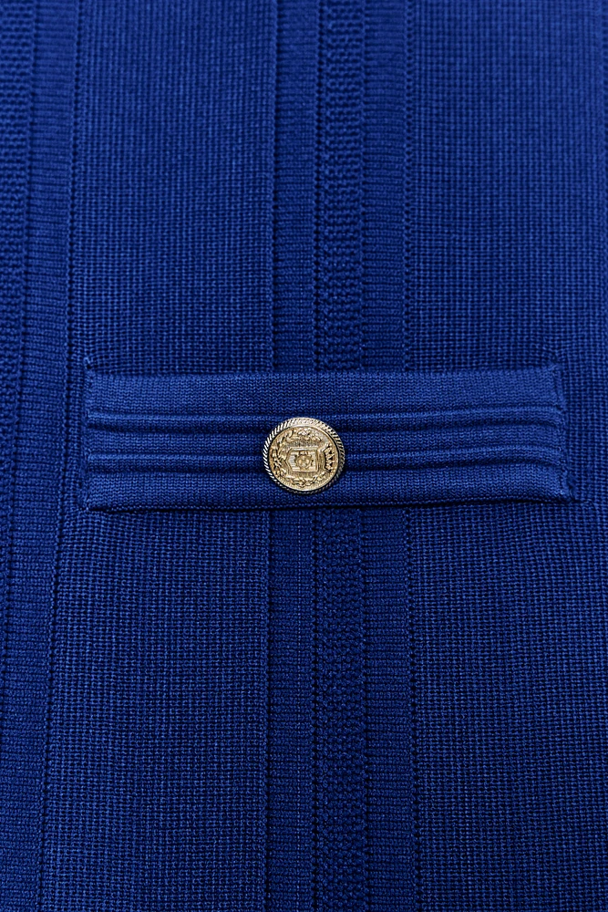 ROBE EN MAILLE À PLIS PLATS