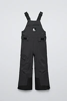 WATER REPELLENT AND WINDPROOF RECCO® SYSTEM SUSPENDERS JUMPSUIT SKI COLLECTION