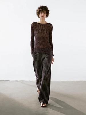 Asymmetric cutwork sweater