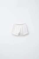 PLAIN COMBINATION BERMUDA SHORTS