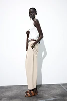 PLEATED CHINO PANTS